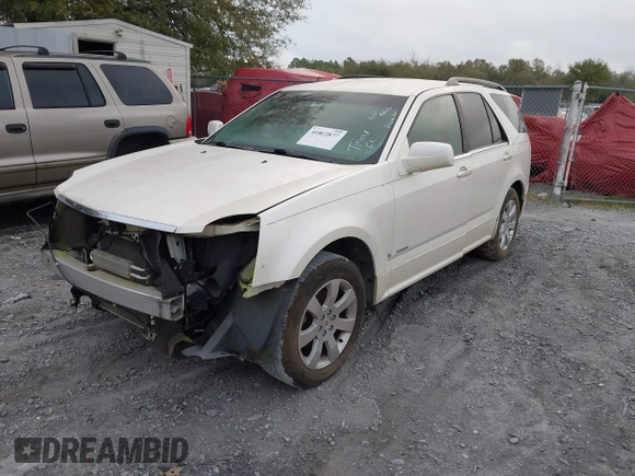 2008 Cadillac SRX RWD z VIN 1GYEE637580123768, wystawiony jako IAAI lot #41802877 z przebiegiem 149 249 mil mil oraz . Historia ofert i sprzedaży dostępna na DreamBid. Obrazek 2.