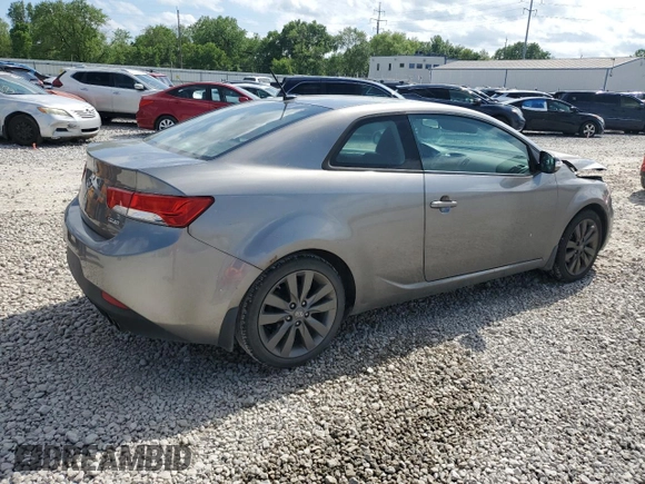 2012 Kia Forte SX с VIN KNAFW6A34C5481086, выставлен на аукционе Copart как лот 57241265 с пробегом 117 233 миль миль и Списание • Salvage title. История ставок и продаж доступна на DreamBid. Изображение 3.