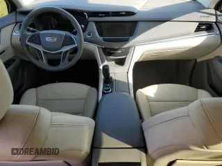 2021 Cadillac XT5 FWD Premium Luxury with VIN 1GYKNCRS0MZ173433, listed as a Copart auction lot 82934194 with Not Provided miles and Non Repairable. Bid and sale history available at carsss.com. Image 8.