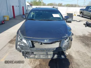 2015 Kia Optima LX with VIN 5XXGM4A77FG381505, listed as a IAAI auction lot 42105568 with 164,641 mi miles and . Bid and sale history available at DreamBid. Image 13.