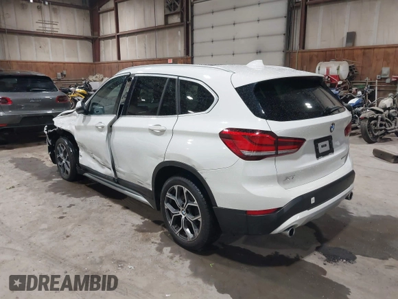2021 BMW X1 xDrive28i with VIN WBXJG9C04M5T82884, listed as a IAAI auction lot 42242890 with 24,647 mi miles and . Bid and sale history available at DreamBid. Image 3.