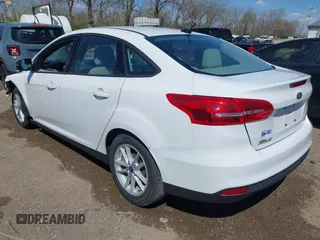 2018 Ford Focus SE with VIN 1FADP3F2XJL310931, listed as a IAAI auction lot 41983492 with 115,363 mi miles. Bid and sale history available at carsss.com. Image 3.