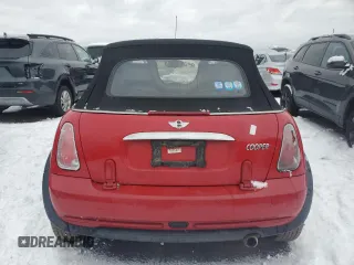 2005 MINI Convertible z VIN WMWRF33405TG11092, wystawiony jako Copart lot #84762004 z przebiegiem 94 895 mil mil oraz Szkoda całkowita • Salvage title. Historia ofert i sprzedaży dostępna na DreamBid. Obrazek 6.
