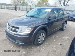 2014 Dodge Journey SE with VIN 3C4PDCAB1ET219760, listed as a IAAI auction lot 42013441 with 106,212 mi miles and . Bid and sale history available at carsss.com. Image 18.