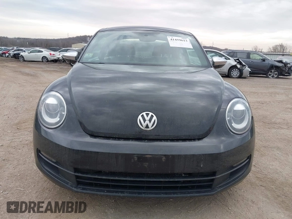 2013 Volkswagen Beetle 2.5L with VIN 3VWJP7AT8DM679548, listed as a IAAI auction lot 41459613 with 135,198 mi miles and . Bid and sale history available at DreamBid. Image 12.