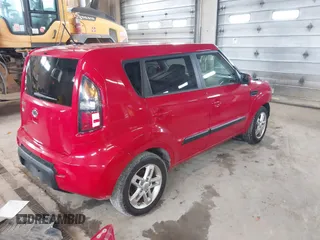 2011 Kia Soul + with VIN KNDJT2A23B7329051, listed as a IAAI auction lot 41963566 with 146,063 mi miles. Bid and sale history available at carsss.com. Image 4.