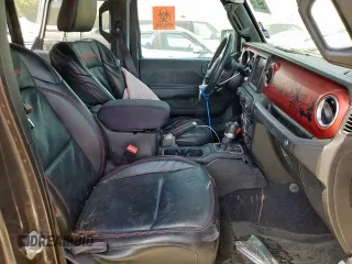 2018 Jeep Wrangler Unlimited Rubicon with VIN 1C4HJXFG6JW166731, listed as a Copart auction lot 56997385 with 117,713 mi miles and Salvage title. Bid and sale history available at DreamBid. Image 7.
