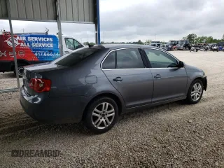 2007 Volkswagen Jetta 2.5 с VIN 3VWSF71KX7M032930, выставлен на аукционе Copart как лот 56703405 с пробегом 216 233 миль миль и Списание • Salvage title. История ставок и продаж доступна на DreamBid. Изображение 3.