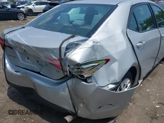 2018 Toyota Corolla L with VIN 2T1BURHE8JC116054, listed as a IAAI auction lot 42450016 with 65,342 mi miles and . Bid and sale history available at DreamBid. Image 6.