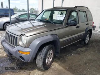 2003 Jeep Liberty Sport z VIN 1J4GK48K63W602709, wystawiony jako IAAI lot #42176496 z przebiegiem 151 397 mil mil oraz . Historia ofert i sprzedaży dostępna na DreamBid. Obrazek 2.