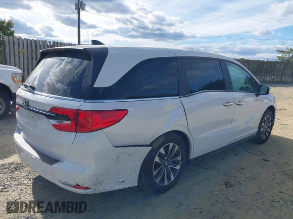 2024 Honda Odyssey EX-L with VIN 5FNRL6H65RB007535, listed as a IAAI auction lot 40602982 with 6,097 mi miles and . Bid and sale history available at DreamBid. Image 4.