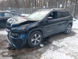2019 Jeep Cherokee Limited with VIN 1C4PJMDX4KD303952, listed as a IAAI auction lot 41404083 with 166,741 mi miles. Bid and sale history available at carsss.com. Image 17.