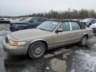 2001 Mercury Grand Marquis GS z VIN 2MEFM74W11X701900, wystawiony jako Copart lot #41913965 z przebiegiem 79 360 mil mil oraz Tytuł czysty. Historia ofert i sprzedaży dostępna na DreamBid. Obrazek 1.