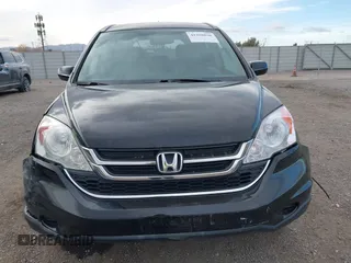 2011 Honda CR-V EX-L with VIN 5J6RE3H77BL021340, listed as a IAAI auction lot 41208898 with 153,096 mi miles. Bid and sale history available at carsss.com. Image 12.