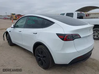 2025 Tesla Model Y Long Range with VIN 7SAYGDEE3SA359986, listed as a IAAI auction lot 41370788 with 4 miles. Bid and sale history available at carsss.com. Image 3.