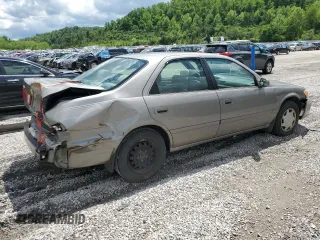 2000 Toyota Camry CE z VIN 4T1BG22K5YU013891, wystawiony jako Copart lot #56693255 z przebiegiem 248 922 mil mil oraz Szkoda całkowita • Salvage title. Historia ofert i sprzedaży dostępna na DreamBid. Obrazek 3.
