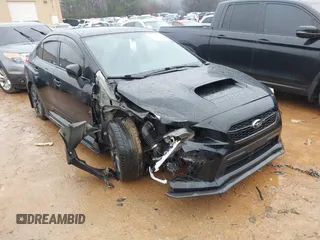 2018 Subaru WRX Premium with VIN JF1VA1C61J9801614, listed as a IAAI auction lot 41244911 with 101,650 mi miles. Bid and sale history available at carsss.com. Image 1.