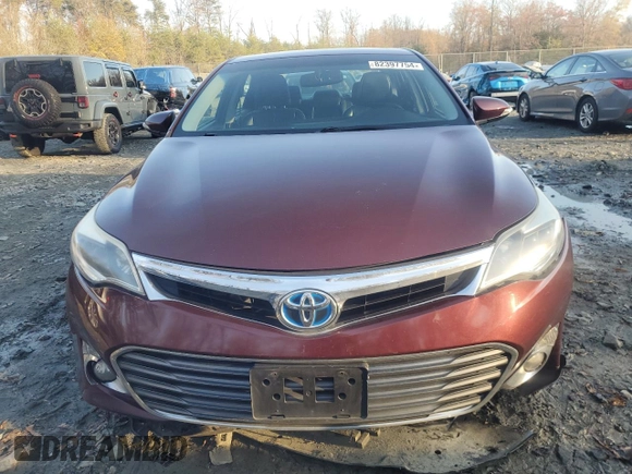 2014 Toyota Avalon Limited z VIN 4T1BD1EB2EU031808, wystawiony jako Copart lot #82397754 z przebiegiem Nie podano mil oraz Szkoda całkowita • Salvage title. Historia ofert i sprzedaży dostępna na DreamBid. Obrazek 5.