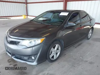 2012 Toyota Camry L with VIN 4T1BF1FKXCU617498, listed as a IAAI auction lot 42114337 with 323,770 mi miles. Bid and sale history available at carsss.com. Image 2.
