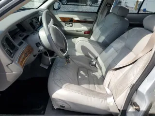 1999 Mercury Grand Marquis LS with VIN 2MEFM75WXXX682027, listed as a Copart auction lot 53906165 with 116,616 mi miles and Salvage Title. Bid and sale history available at DreamBid. Image 7.