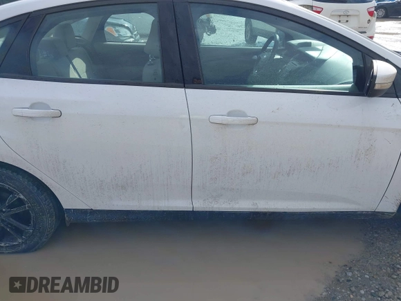 2016 Ford Focus SE z VIN 1FADP3F23GL343651, wystawiony jako IAAI lot #41668112 z przebiegiem 120 891 mil mil oraz . Historia ofert i sprzedaży dostępna na DreamBid. Obrazek 14.