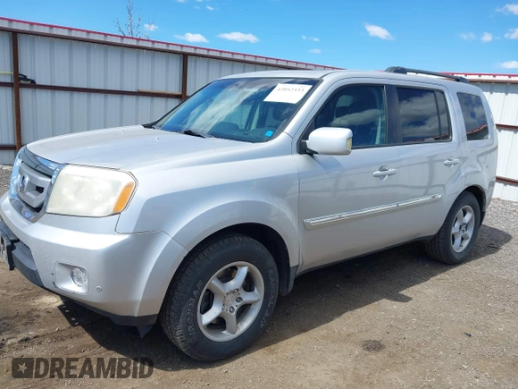 2009 Honda Pilot Touring with VIN 5FNYF48969B018075, listed as a IAAI auction lot 42052333 with 206,700 mi miles and . Bid and sale history available at carsss.com. Image 2.
