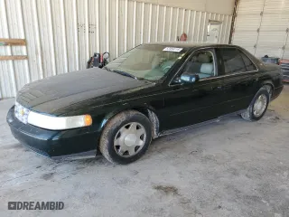 1999 Cadillac Seville Luxury SLS with VIN 1G6KS54Y5XU920020, listed as a Copart auction lot 53956115 with 104,096 mi miles and Clean Title. Bid and sale history available at carsss.com. Image 1.