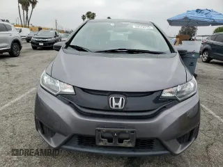 2015 Honda Fit LX z VIN 3HGGK5H58FM785137, wystawiony jako Copart lot #59013315 z przebiegiem 84 592 mil mil oraz Szkoda całkowita • Salvage title. Historia ofert i sprzedaży dostępna na DreamBid. Obrazek 5.