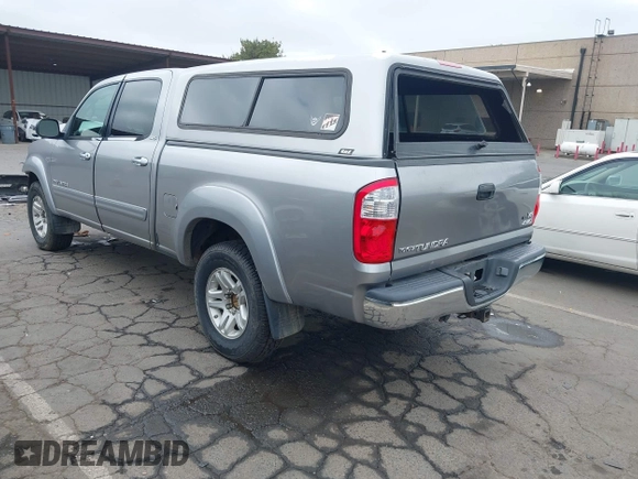 2005 Toyota Tundra SR5 with VIN 5TBDT441X5S479169, listed as a IAAI auction lot 42058790 with 323,936 mi miles and . Bid and sale history available at DreamBid. Image 3.
