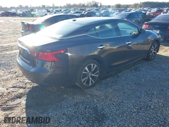 2016 Nissan Maxima SL with VIN 1N4AA6AP1GC448472, listed as a IAAI auction lot 41329749 with 152,644 mi miles and . Bid and sale history available at DreamBid. Image 4.
