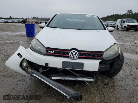 2011 Volkswagen GTI w/Sunroof z VIN WVWFV7AJ2BW088965, wystawiony jako Copart lot #86633634 z przebiegiem 139 017 mil mil oraz Szkoda całkowita • Salvage title. Historia ofert i sprzedaży dostępna na DreamBid. Obrazek 5.