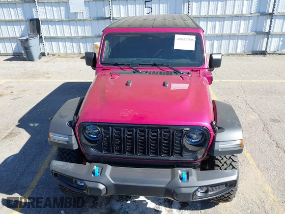 2024 Jeep Wrangler Sport S with VIN 1C4RJXN6XRW323881, listed as a IAAI auction lot 40543759 with 4,440 mi miles and . Bid and sale history available at DreamBid. Image 13.