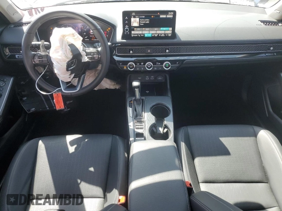 2023 Honda Civic Touring z VIN 2HGFE1F94PH310134, wystawiony jako Copart lot #52311085 z przebiegiem 32 682 mil mil oraz Szkoda całkowita • Salvage title. Historia ofert i sprzedaży dostępna na DreamBid. Obrazek 8.