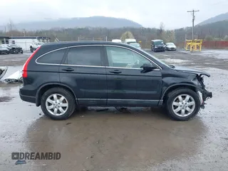 2009 Honda CR-V EX with VIN 5J6RE48509L045901, listed as a IAAI auction lot 41990313 with 223,305 mi miles and . Bid and sale history available at DreamBid. Image 14.