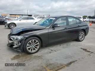 2018 BMW 3 Series 320i xDrive with VIN WBA8E5G5XJNU46001, listed as a Copart auction lot 62166925 with 72,423 mi miles and Salvage title. Bid and sale history available at DreamBid. Image 1.