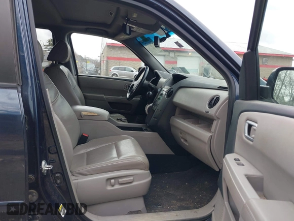 2011 Honda Pilot EX-L with VIN 5FNYF4H59BB052417, listed as a IAAI auction lot 42004376 with 223,854 mi miles. Bid and sale history available at carsss.com. Image 5.
