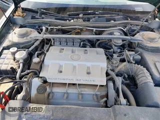 1995 Cadillac Concours z VIN 1G6KF52YXSU302434, wystawiony jako IAAI lot #42231281 z przebiegiem 153 236 mil mil oraz . Historia ofert i sprzedaży dostępna na DreamBid. Obrazek 10.