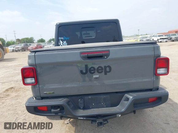 2021 Jeep Gladiator Sport S z VIN 1C6JJTAM1ML607525, wystawiony jako IAAI lot #41941550 z przebiegiem 59 283 mil mil oraz . Historia ofert i sprzedaży dostępna na DreamBid. Obrazek 16.