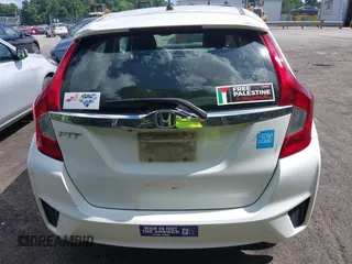2016 Honda Fit EX z VIN JHMGK5H78GX014803, wystawiony jako IAAI lot #42539208 z przebiegiem 79 433 mil mil oraz . Historia ofert i sprzedaży dostępna na DreamBid. Obrazek 16.