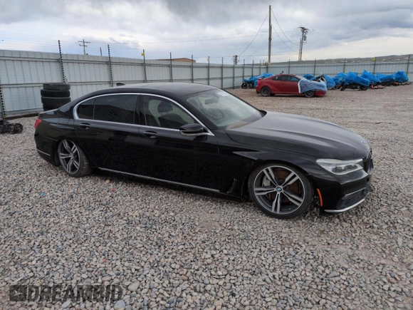 2017 BMW 7 Series 750i с VIN WBA7F0C35HGM21697, выставлен на аукционе Copart как лот 54713825 с пробегом Не указан миль и Списание • Salvage title. История ставок и продаж доступна на DreamBid. Изображение 4.