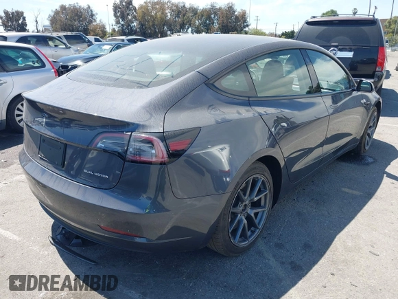 2023 Tesla Model 3 Long Range with VIN 5YJ3E1EB6PF682747, listed as a IAAI auction lot 41980506 with 32,541 mi miles and . Bid and sale history available at DreamBid. Image 4.