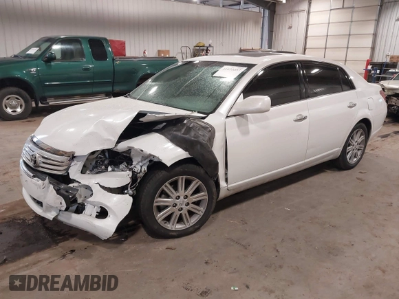 2010 Toyota Avalon XL with VIN 4T1BK3DB9AU358803, listed as a IAAI auction lot 41072257 with 157,185 mi miles and . Bid and sale history available at DreamBid. Image 2.