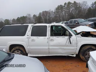 2004 Chevrolet Suburban LS with VIN 1GNEC16Z54J207144, listed as a IAAI auction lot 41244963 with 246,498 mi miles. Bid and sale history available at carsss.com. Image 13.