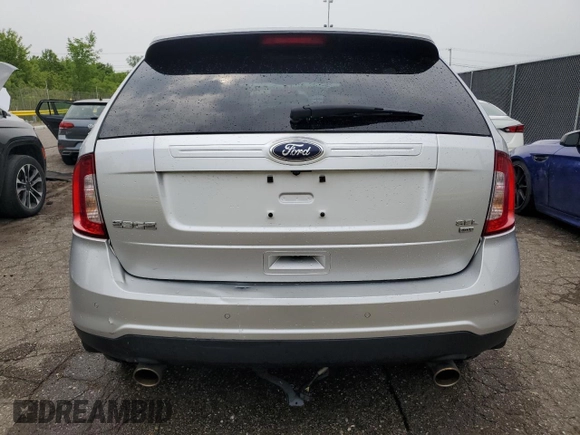 2014 Ford Edge SEL z VIN 2FMDK4JC2EBA89812, wystawiony jako Copart lot #60299295 z przebiegiem 96 912 mil mil oraz Czysty tytuł • Clean title. Historia ofert i sprzedaży dostępna na DreamBid. Obrazek 6.