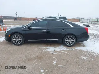 2013 Cadillac XTS Luxury with VIN 2G61R5S30D9100094, listed as a IAAI auction lot 41601711 with 191,068 mi miles and . Bid and sale history available at DreamBid. Image 14.