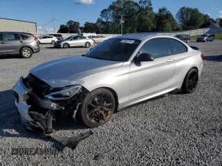 2015 BMW 2 Series M235i with VIN WBA1J7C57FV254038, listed as a Copart auction lot 73657294 with 117,883 mi miles and Salvage Title. Bid and sale history available at carsss.com. Image 1.