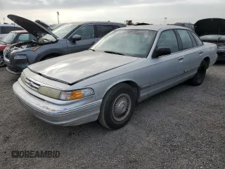 1997 Ford Crown Victoria z VIN 2FALP73W2VX230784, wystawiony jako Copart lot #76339234 z przebiegiem 234 792 mil mil oraz Nie do naprawy • Non repairable. Historia ofert i sprzedaży dostępna na DreamBid. Obrazek 1.