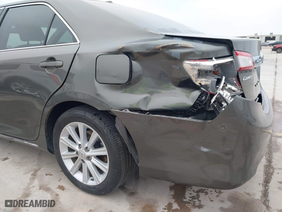 2014 Toyota Camry Hybrid LE with VIN 4T1BD1FK8EU102685, listed as a IAAI auction lot 41469306 with 91,606 mi miles. Bid and sale history available at carsss.com. Image 6.