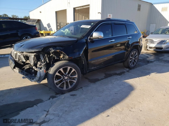 2017 Jeep Grand Cherokee Overland with VIN 1C4RJECGXHC659417, listed as a Copart auction lot 80168894 with 118,934 mi miles and Salvage Title. Bid and sale history available at carsss.com. Image 1.
