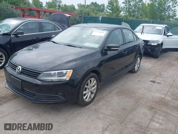 2011 Volkswagen Jetta SE with VIN 3VWDX7AJ7BM052493, listed as a IAAI auction lot 42745045 with 179,732 mi miles and . Bid and sale history available at DreamBid. Image 2.